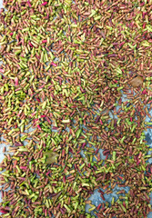 Drying clove buds under the summer sun. Sun dried cloves cloves are a plantation product that can be relied upon to support the economy of farming communities. Selective focus.
