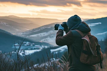 Foto auf Alu-Dibond A photographer taking a landscape photo with his camera © Emanuel