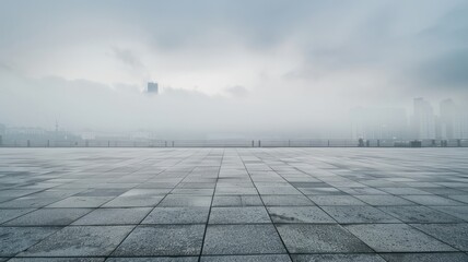 white empty asphalt square and city landscape under a white cloudy and foggy sky. Ambient light