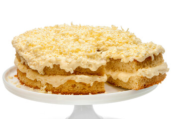 creamy white chocolate cake on cutout background