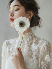 白い花を持つ花嫁 - obrazy, fototapety, plakaty