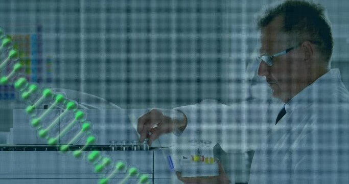 Animation of dna strand over caucasian male scientist working in lab