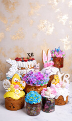 Easter cakes with icing decorations, bunnies, chicks, flowers - perfect for celebration.