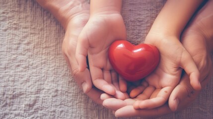 adult and child hands holding red heart, heart health, world heart day,Ai generated