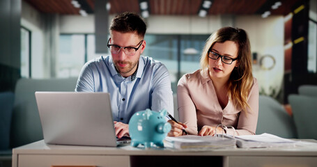 Happy Couple Doing Retire Finances Plan