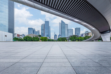Fototapeta premium Empty square platform and commercial building background