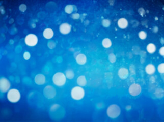 Realistic blue gradient background with a bokeh effect.