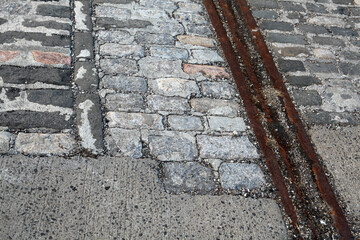Detail of cobbles and rusty rails - Ocean terminal - Port of Leith - Edinburgh - Midlothian -...