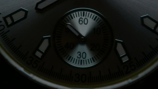 Silver Clock face time lapse. Clock time ticking on a classic hand Clock. Shadows moving over the Watch. Time pressure and deadline concept. Time flow macro. 