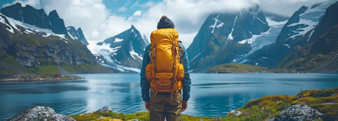 Cercles muraux Europe du nord A Man Seeking Happiness in the Picture-Perfect Norwegian Landscape