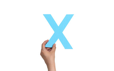 Obraz premium closeup hand holding paper letter X isolated on white