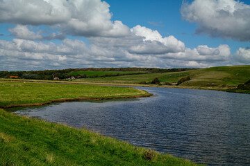 Fototapeta premium A beautiful pond with hill scenery in England