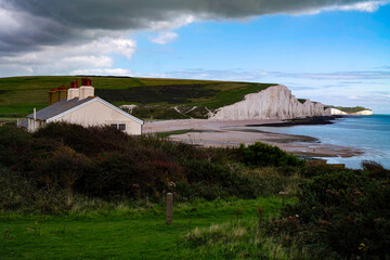 Fototapeta na wymiar A house near seven sisters hill in south coast England on a sunny but cloudy afternoon