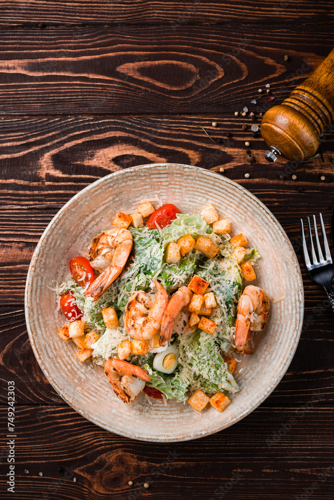 Canvas Prints lunch caesar salad with shrimps, parmesan cheese, lettuce, cherry tomatoes and croutons.