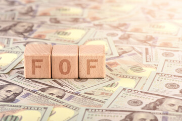 There are blocks with FOF letters printed on the US dollar props