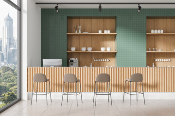 Stylish wooden and green cafe interior with counter and cash desk, window