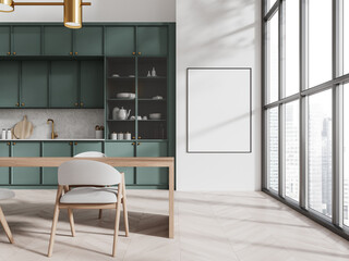 White and green kitchen interior with table and poster