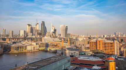 Fototapeta na wymiar Modern London skyline with shard building on horizon at sunset on cloudy day