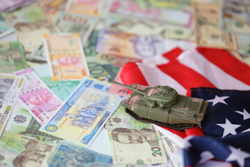 Tank on United States flag on many banknotes of different currency. Background of war funding and military support price for United States of America