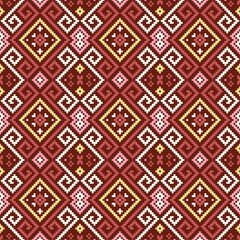 Ethnic pattern features interlocking geometric shapes in a seamless repeat pattern,pink,yellow and brown on a beige background.