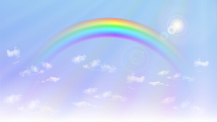 Rainbow on blue sky background 虹のかかった日が差し込む雨上がりの空
