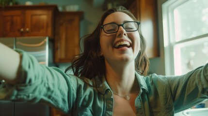 Capture the joyous moment of a young, beautiful woman in the kitchen, wearing glasses and a green shirt, celebrating the successful passing of the exam. 