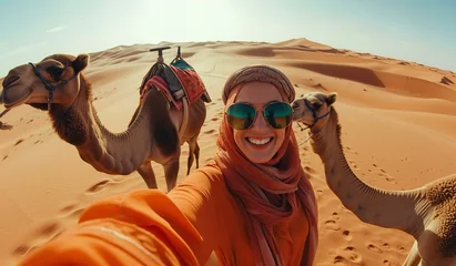 Selbstklebende Fototapeten camels in the desert © Lemar