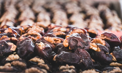 Oriental sweets at the Siab Bazaar in the ancient city of Samarkand in Uzbekistan, nougat with nuts at Siyob bozor