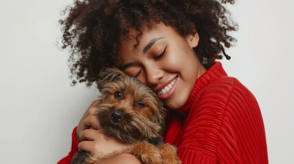 Joyful embrace between a woman and her furry friend.