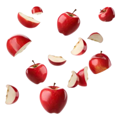 Fotobehang  Red apples and apple slices floating in the air, isolated on transparent background. generative ai.  © AL