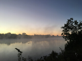 Sunrise - Ducks Enjoying the Calm Water of  Morning