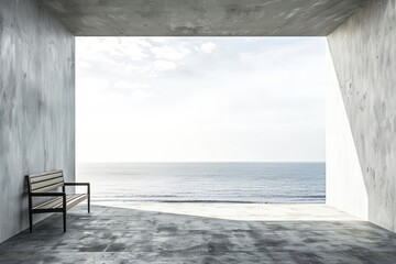 A peaceful scene with a single bench framed by concrete looking out into the vast sea and sky