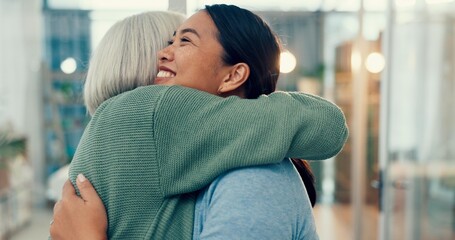 Senior woman, hug and old friend at a business office with a smile, support and excited. Elderly...