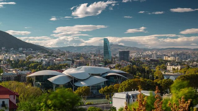 sunny day Tbilisi city downtown famous modern ministry building exterior panorama 4k timelapse georgia