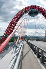 A modern highway across the picturesque bridge over the Moscow River.