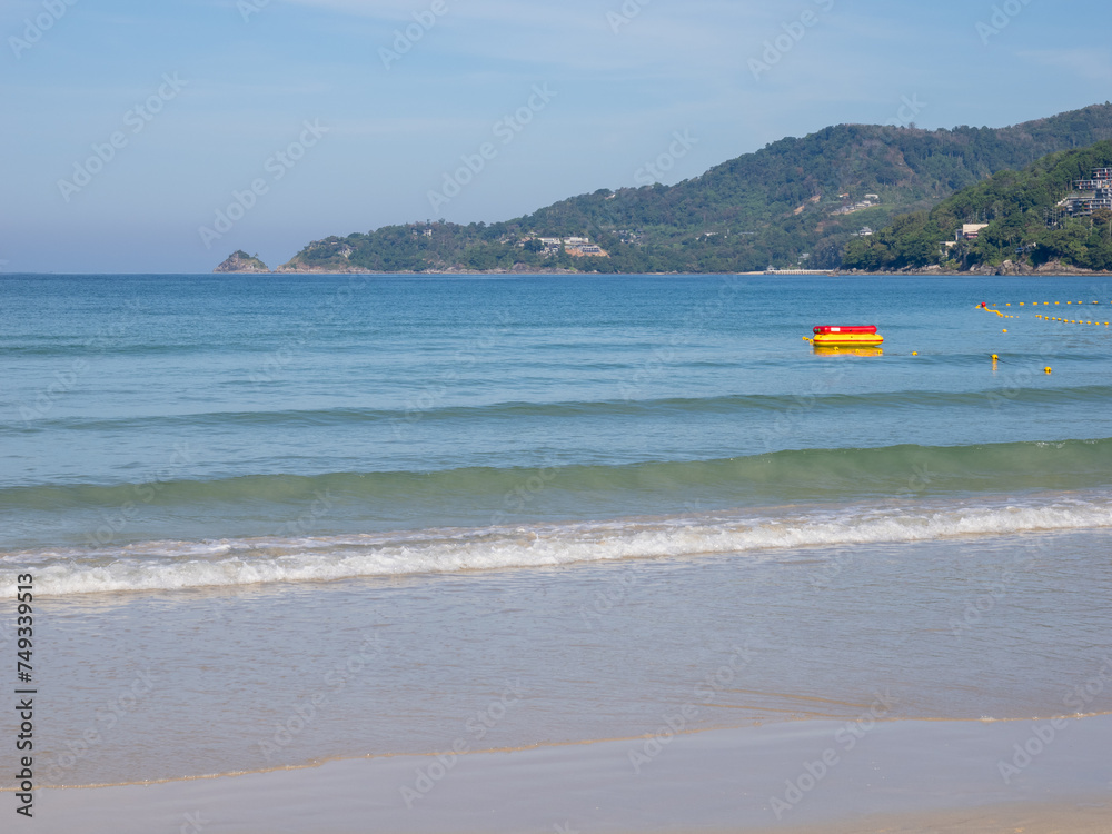 Wall mural calm waters of patong beach in early morning - phuket, thailand