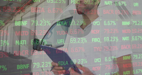 Image of financial data processing over delivery man holding clipboard outside of warehouse