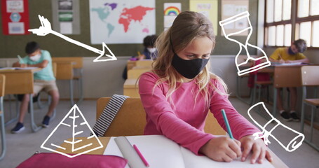Obraz premium Image of school items icons moving over schoolchildren wearing face masks