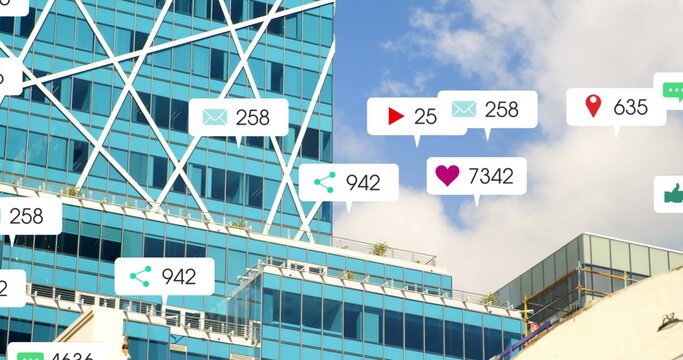Image of social media icons and numbers on banners over cityscape