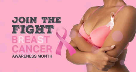 Image of breast cancer awareness text over african american woman on pink background