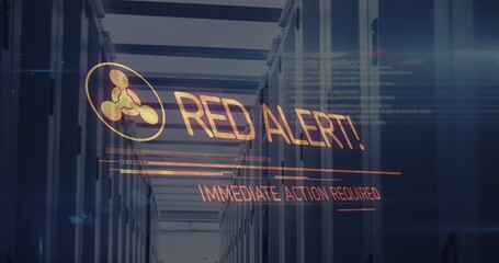 Image of red alert text over server room