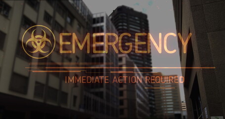 Image of biohazard symbol and emergency text over cityscape