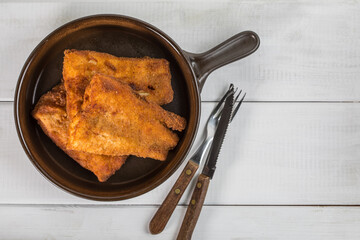 Pieces of cod in breadcrumbs.