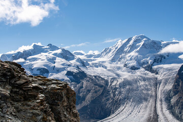 View summer 2021 of Dufourspitze (or Monte Rosa) and Lyskamm in Monte Rosa massif (Pennine Alps) on border of Switzerland and Italy near Zermatt with between peaks the Grenzgletscher (border glacier)