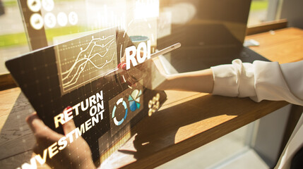 ROI Return on investment reading revenue business concept on virtual screen.