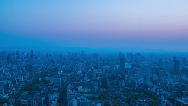 大阪市街地の夜から朝の美しい朝焼けタイムラプス