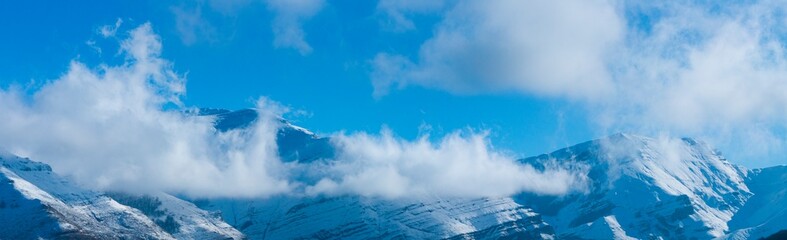 Summits of the Miera Valley in winter, aerial view of the Miera River Valley. Landscape in winter. Valleys Pasiegos. Cantabria. Spain. Europe