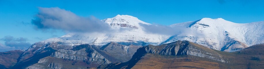 Summits of the Miera Valley in winter, aerial view of the Miera River Valley. Landscape in winter. Valleys Pasiegos. Cantabria. Spain. Europe