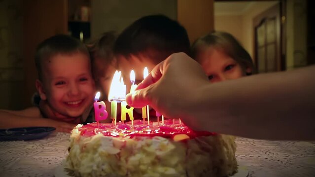 Happy Birthday. Light up the candles on the cake and there is a magical glow