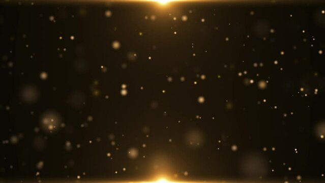 Gold flow and golden glitter particles on dark background, shimmer glow or dust light spray. Motion graphic
